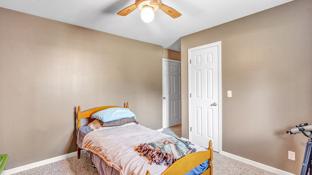 420 No Pone Valley Road Northwest Georgetown, TN 37336 - Photo 30 of 56 a bedroom with a bed and a window