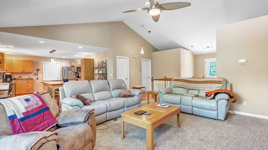 420 No Pone Valley Road Northwest Georgetown, TN 37336 - Photo 8 of 56 a living room with furniture kitchen view and a chandelier