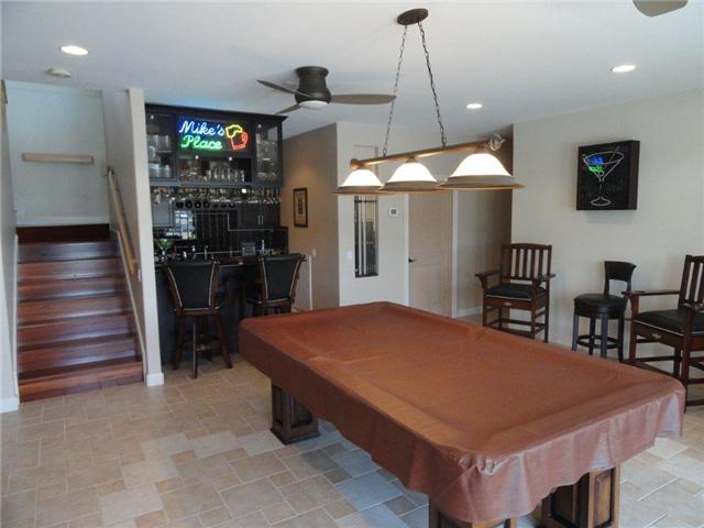 77 Cecil Johnson Road Mulberry, TN 37359 - Photo 11 of 20 a room with table chairs and a ceiling fan