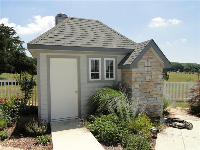 77 Cecil Johnson Road Mulberry, TN 37359 - Photo 16 of 20 a front view of a house with a garden