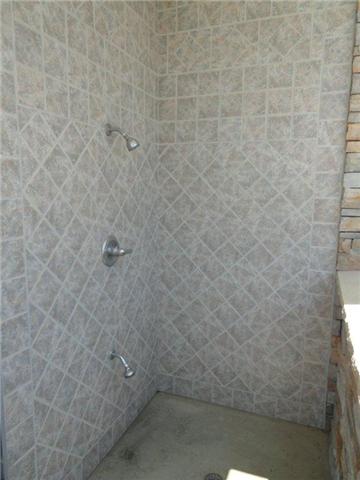 77 Cecil Johnson Road Mulberry, TN 37359 - Photo 17 of 20 a bathroom with a shower