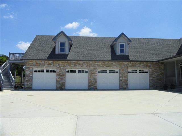 77 Cecil Johnson Road Mulberry, TN 37359 - Photo 3 of 20 a front view of a house with a yard