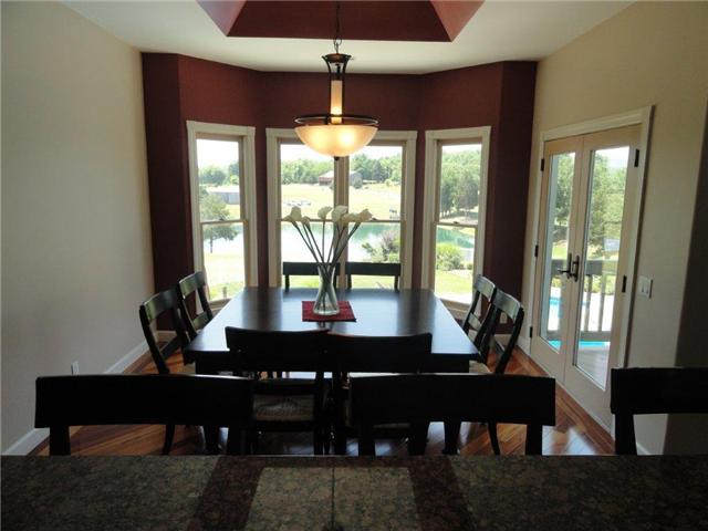 77 Cecil Johnson Road Mulberry, TN 37359 - Photo 6 of 20 a view of a dining room with furniture window and outside view