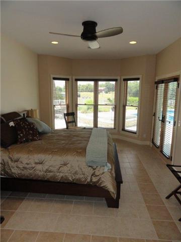 77 Cecil Johnson Road Mulberry, TN 37359 - Photo 10 of 20 a bedroom with a bed and a large window