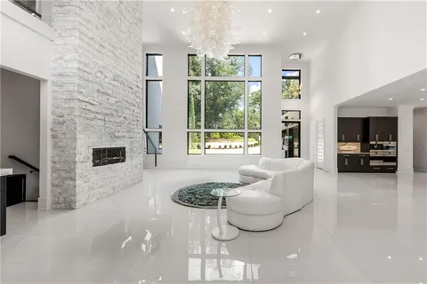 a kitchen with a refrigerator and a sink