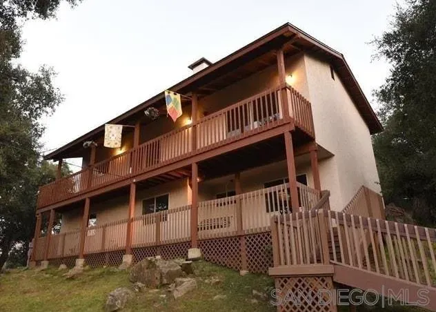 a front view of a house with balcony