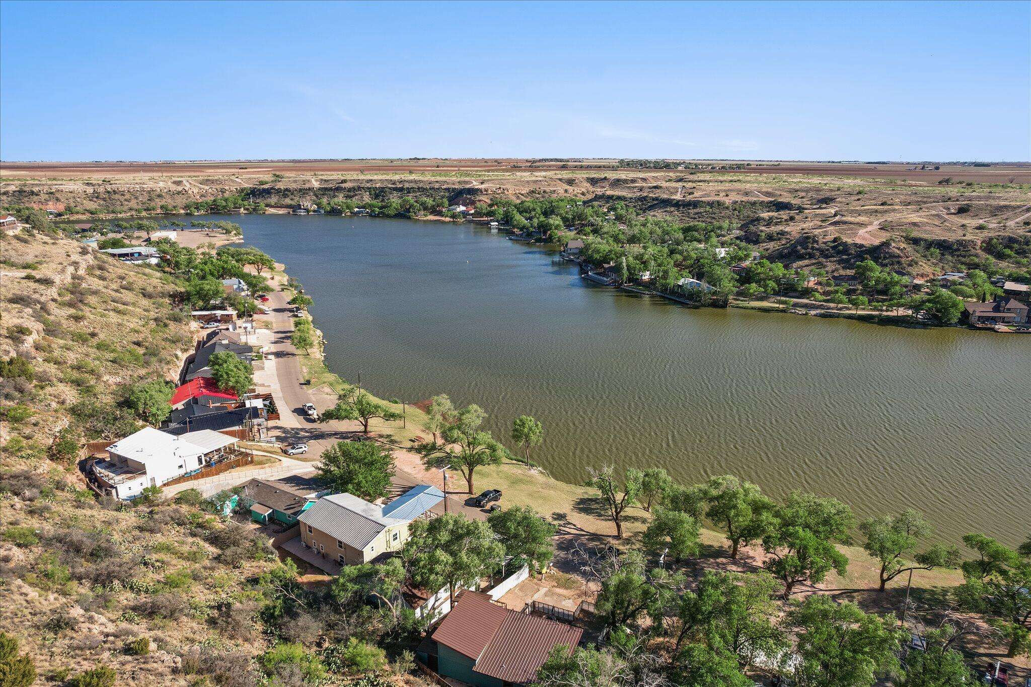69 Pony Express Trail Lubbock, TX 79404 - Photo 34 of 39 an aerial view of a house with a lake view