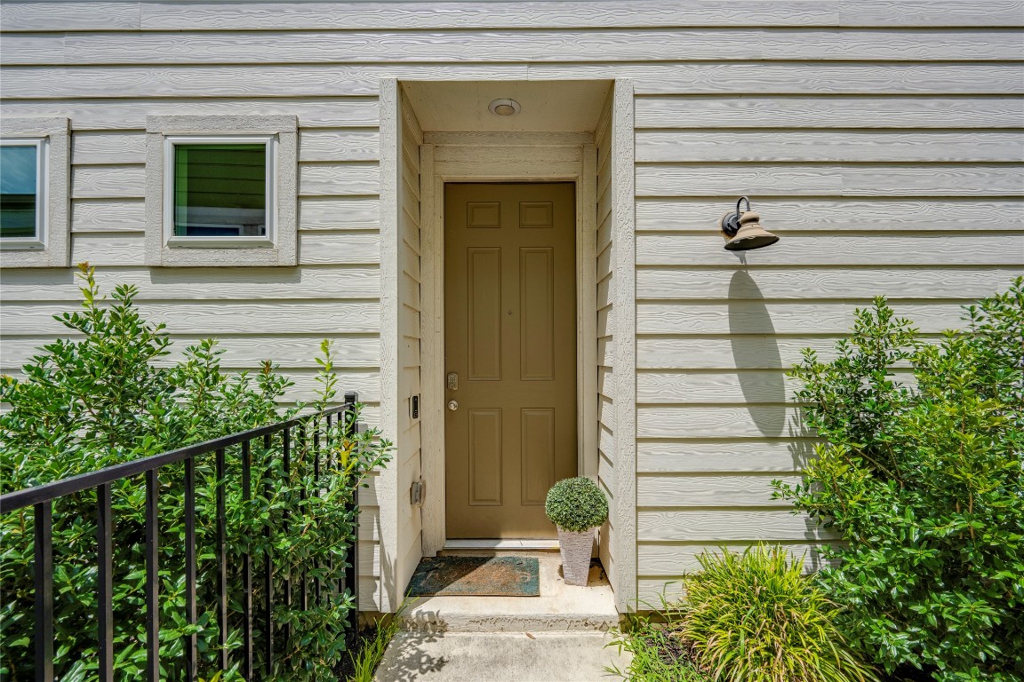 7502 Chesapeake Rail Lane, Unit 154 Austin, TX 78744 - Photo 40 of 40 a house with a outdoor space