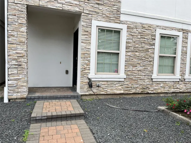 a front view of a house with windows