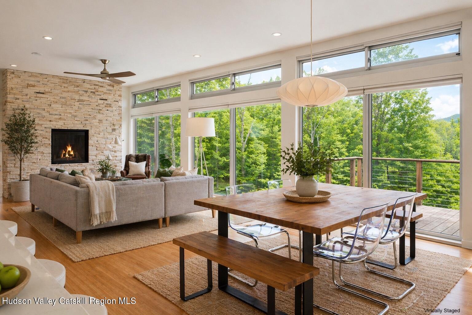 540 Mt Tobias Road Mount Tremper, NY 12457 - Photo 2 of 24 a living room with furniture and a floor to ceiling window