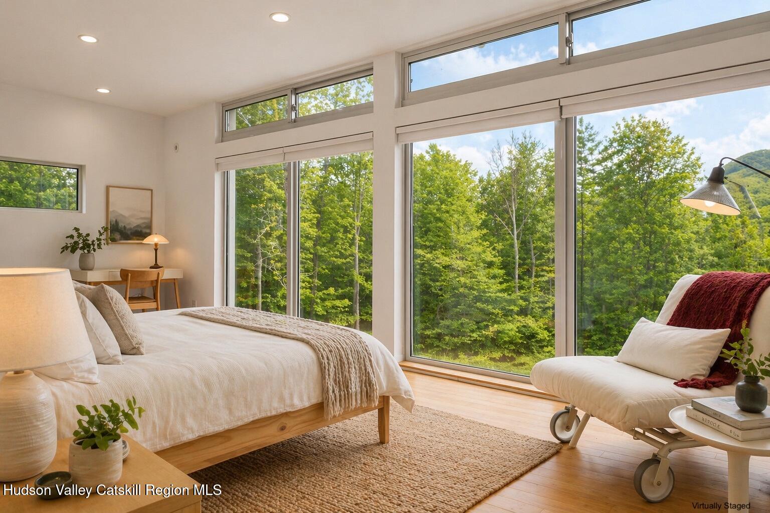 540 Mt Tobias Road Mount Tremper, NY 12457 - Photo 10 of 24 a bed room with a bed and a large window