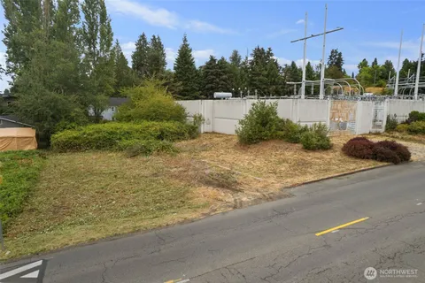 a backyard of a house with lots of green space