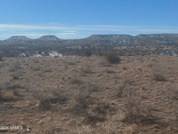 a view of mountain view with mountains in the background