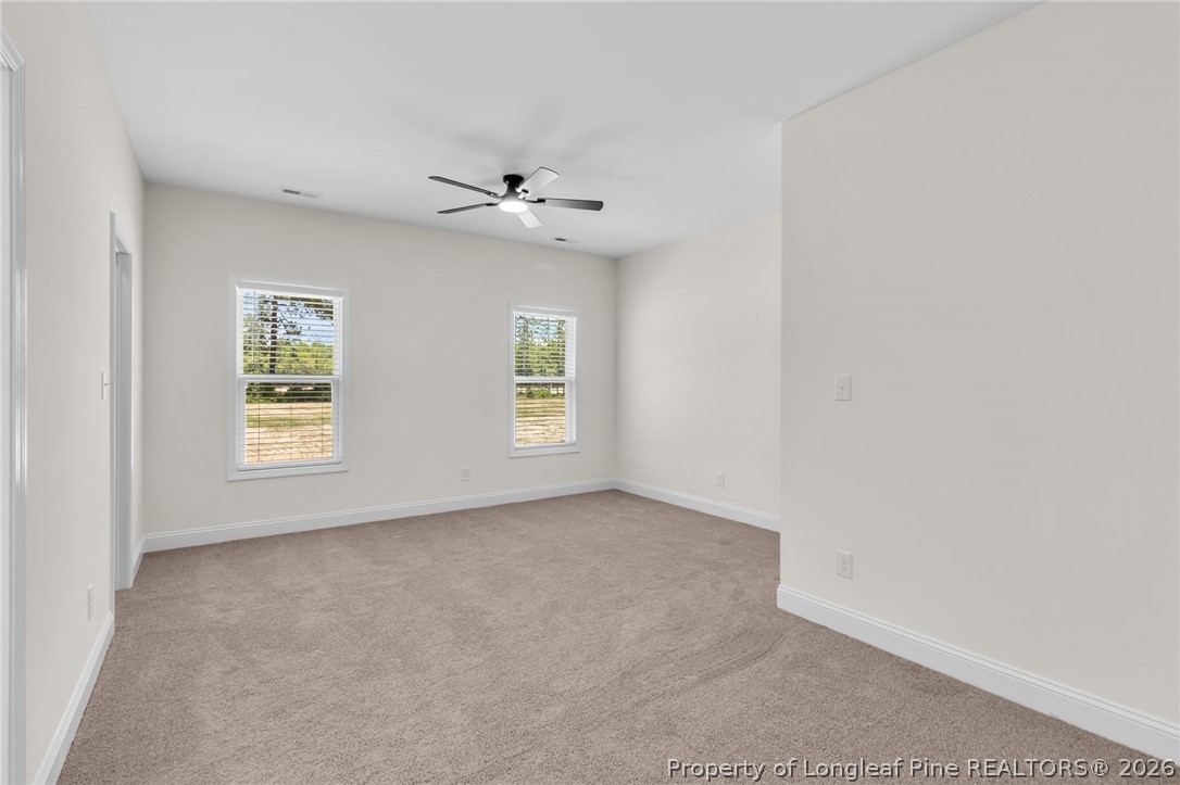 131 Merle Road Pinebluff, NC 28373 - Photo 18 of 33 a view of an empty room with a window