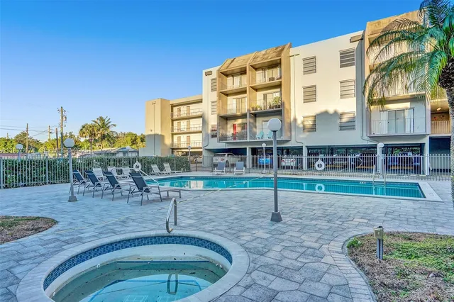 a view of a big building with a yard