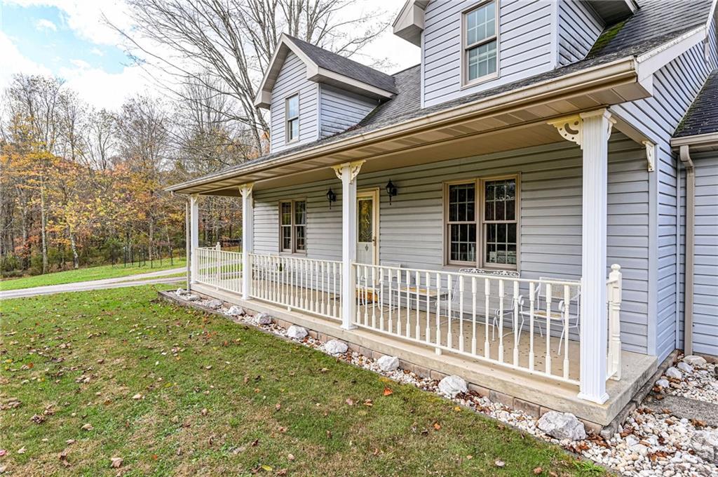 120 Youngstown Ridge Road Ligonier, PA 15658 - Photo 4 of 50 HUGE WRAP AROUND PORCH
