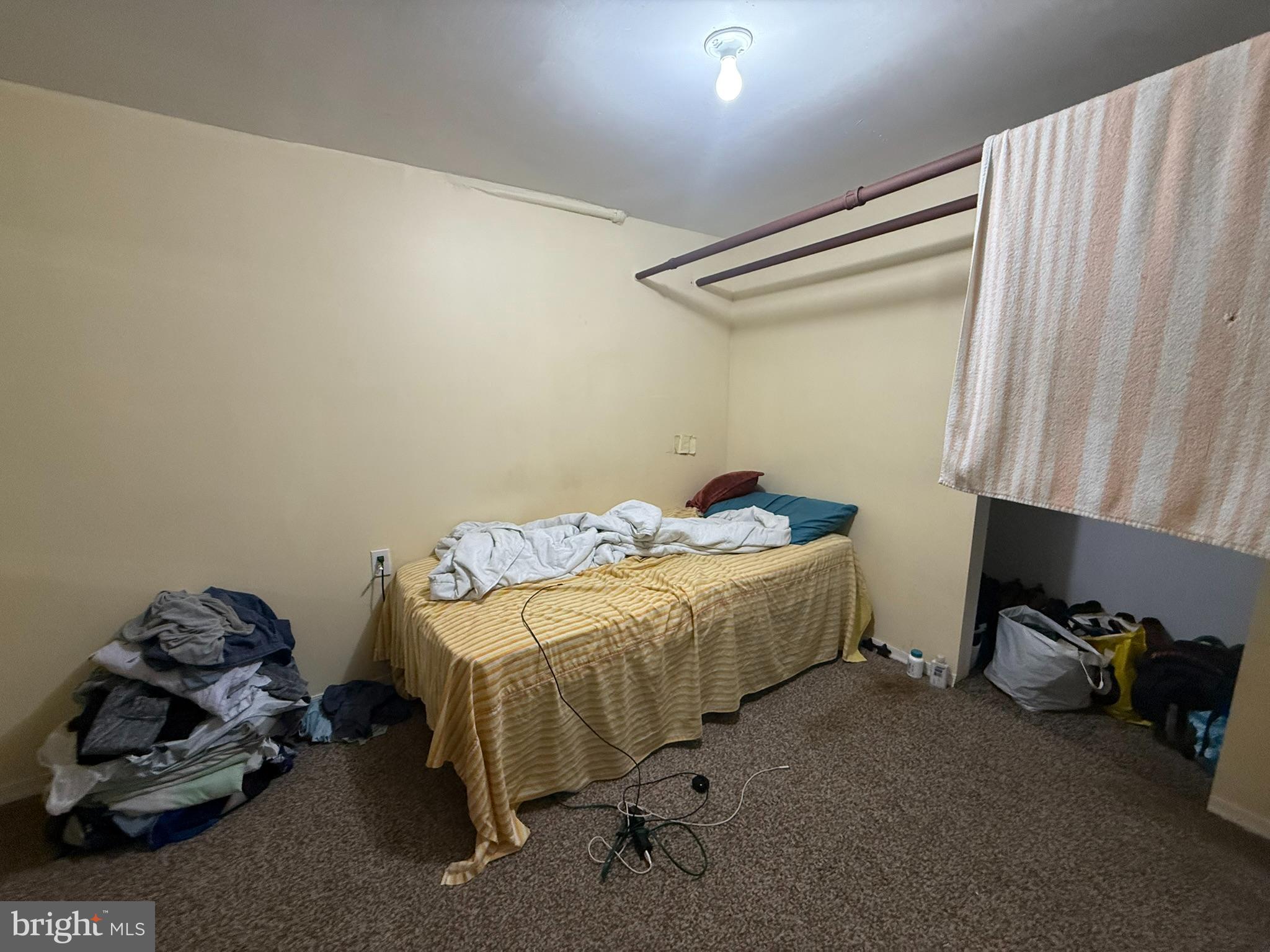 429 Pine Street Steelton, PA 17113 - Photo 17 of 25 a bed sitting in a room next to a window