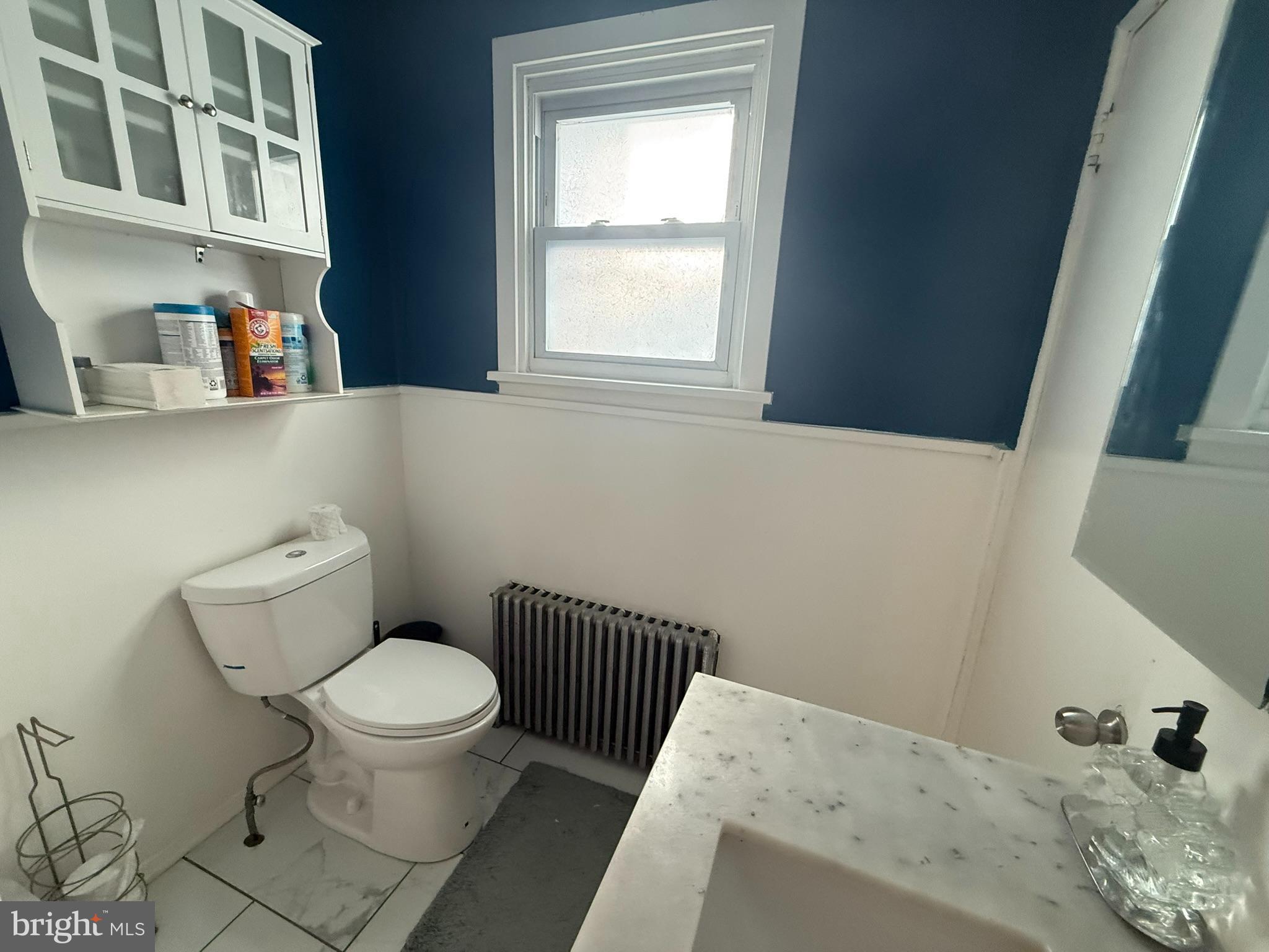 429 Pine Street Steelton, PA 17113 - Photo 10 of 25 a bathroom with a toilet and a window