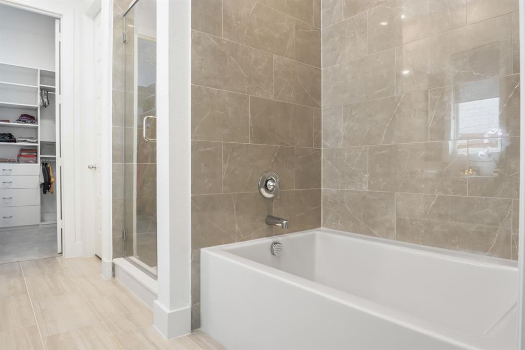 1255 Sumner Street Aubrey, TX 76227 - Photo 15 of 40 a bathroom with a bathtub