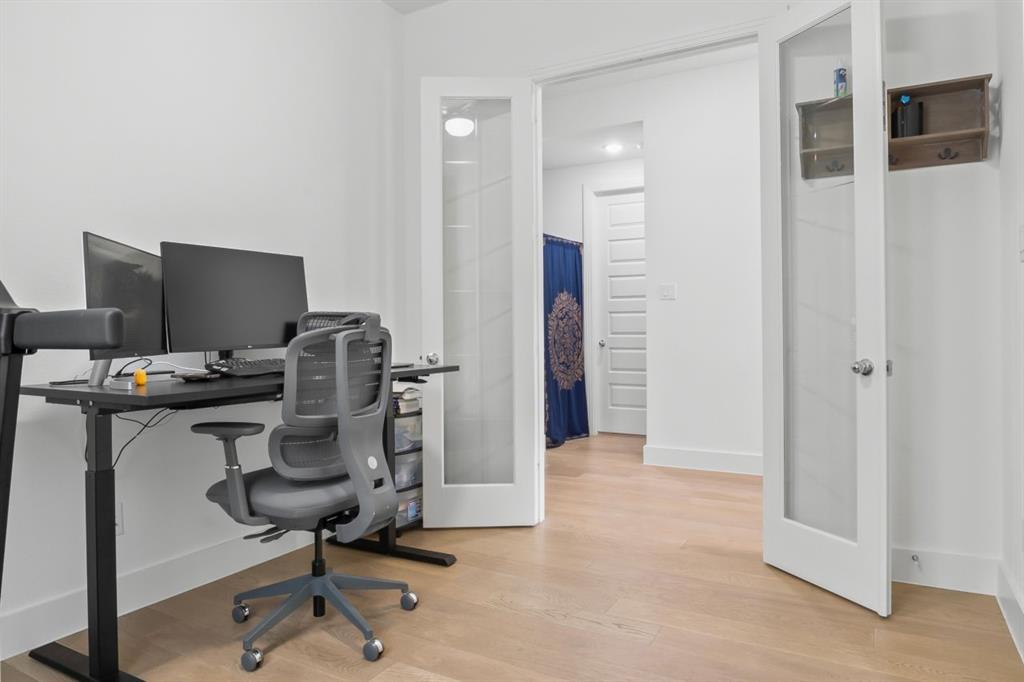 1255 Sumner Street Aubrey, TX 76227 - Photo 20 of 40 a view of a workspace with furniture and a window