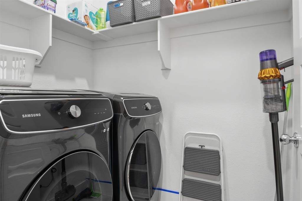 1255 Sumner Street Aubrey, TX 76227 - Photo 35 of 40 a utility room with dryer and washer