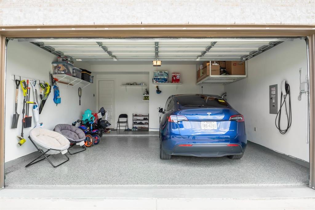 1255 Sumner Street Aubrey, TX 76227 - Photo 36 of 40 a utility room with toys
