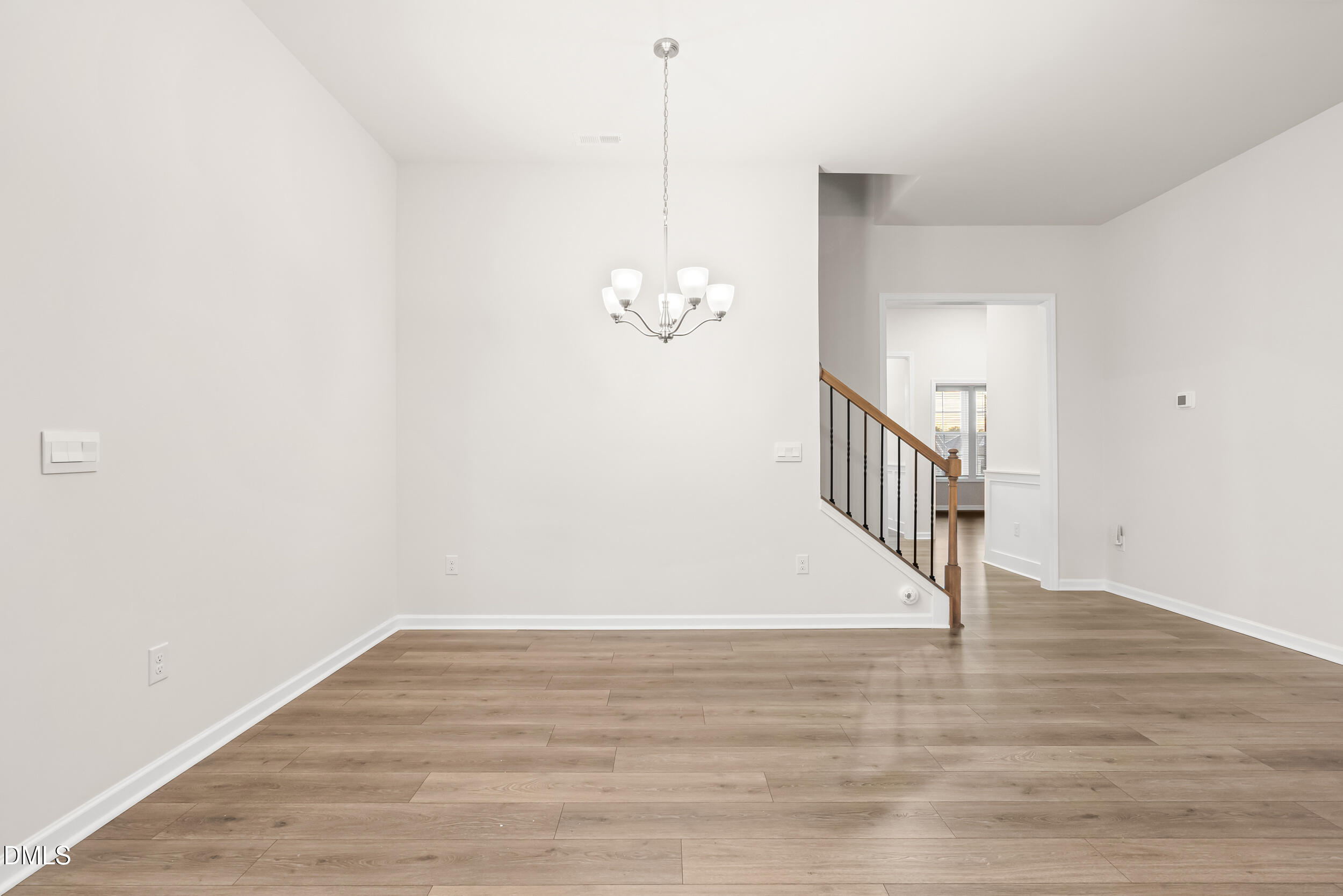 1 Bobby Parker Place Durham, NC 27703 - Photo 11 of 41 a view of a room with wooden floor
