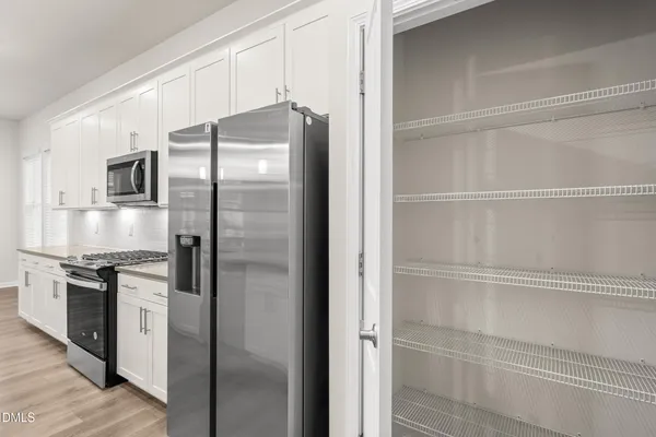 a view of a room with an empty space