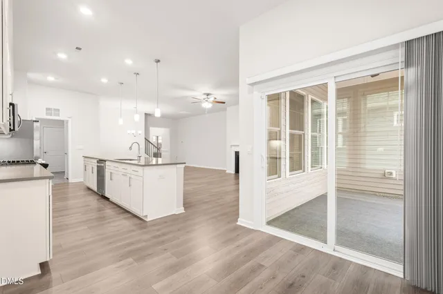 a bathroom with a double vanity sink and mirror