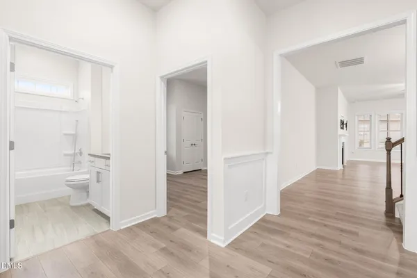 a bathroom with a sink a toilet and a bathtub