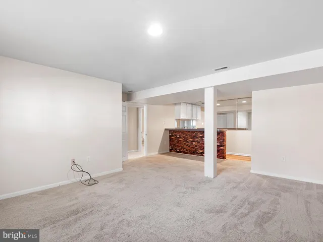 an empty room with a workbench