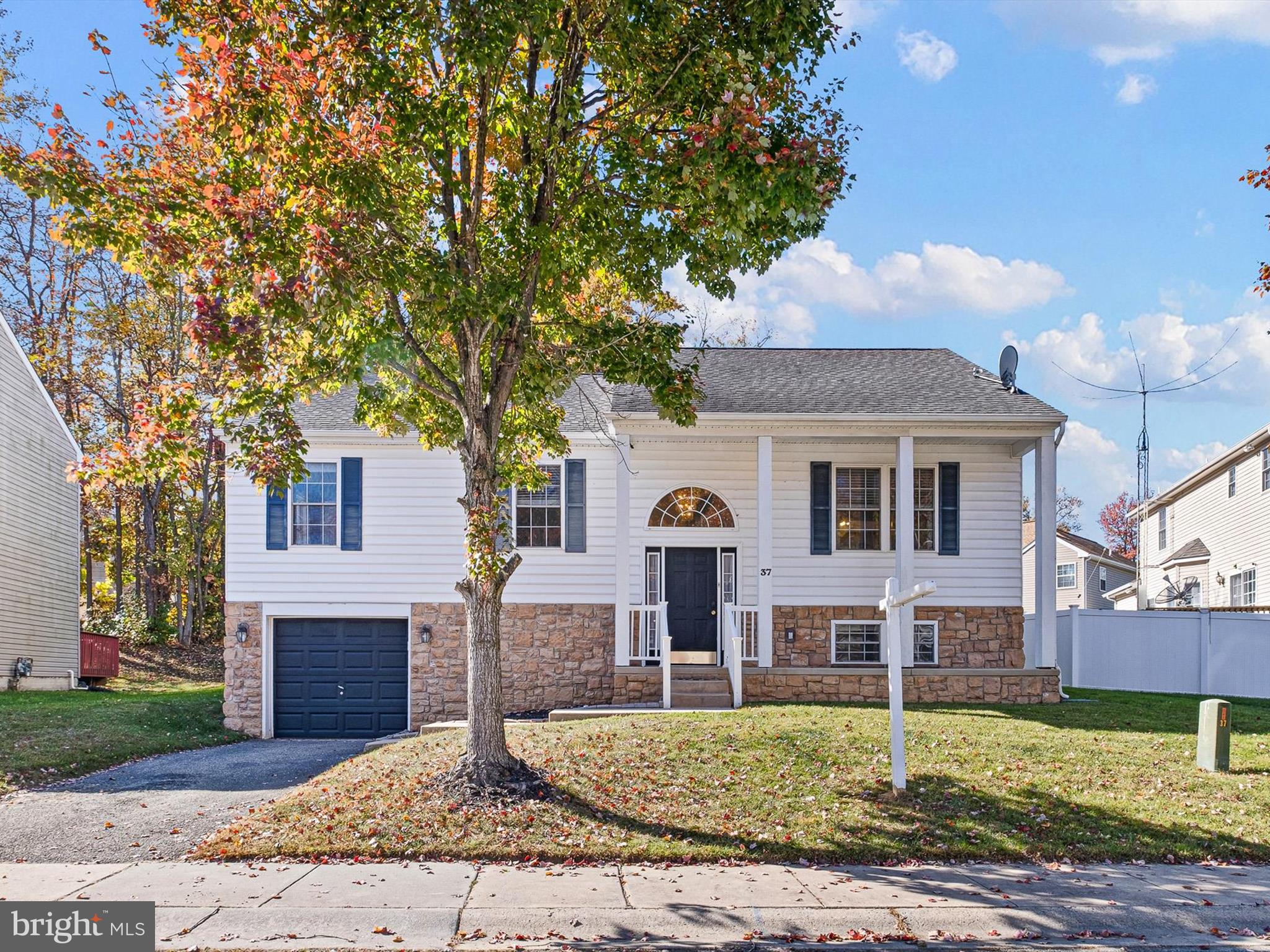 37 Jesse Boyd Circle Elkton, MD 21921 - Photo 3 of 29 a front view of a house with garden