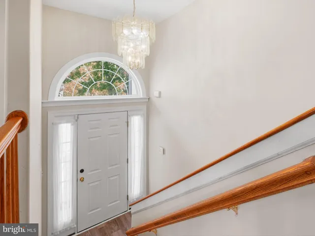 a view of hall with wooden floor