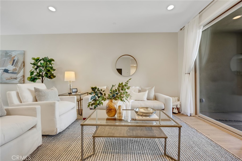 181 Magnet Irvine, CA 92618 - Photo 14 of 45 a living room with furniture flowerpot and wooden floor