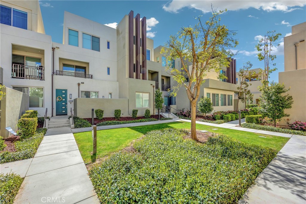 181 Magnet Irvine, CA 92618 - Photo 2 of 45 a front view of a building with a garden