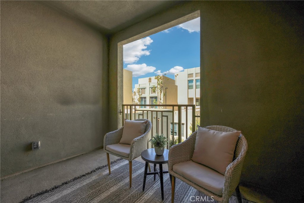 181 Magnet Irvine, CA 92618 - Photo 29 of 45 a view of a chair and table in the balcony
