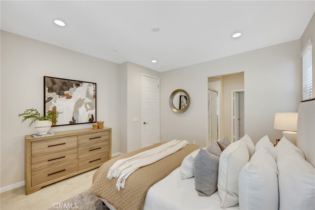 181 Magnet Irvine, CA 92618 - Photo 34 of 45 a bedroom with a bed and painting on the wall