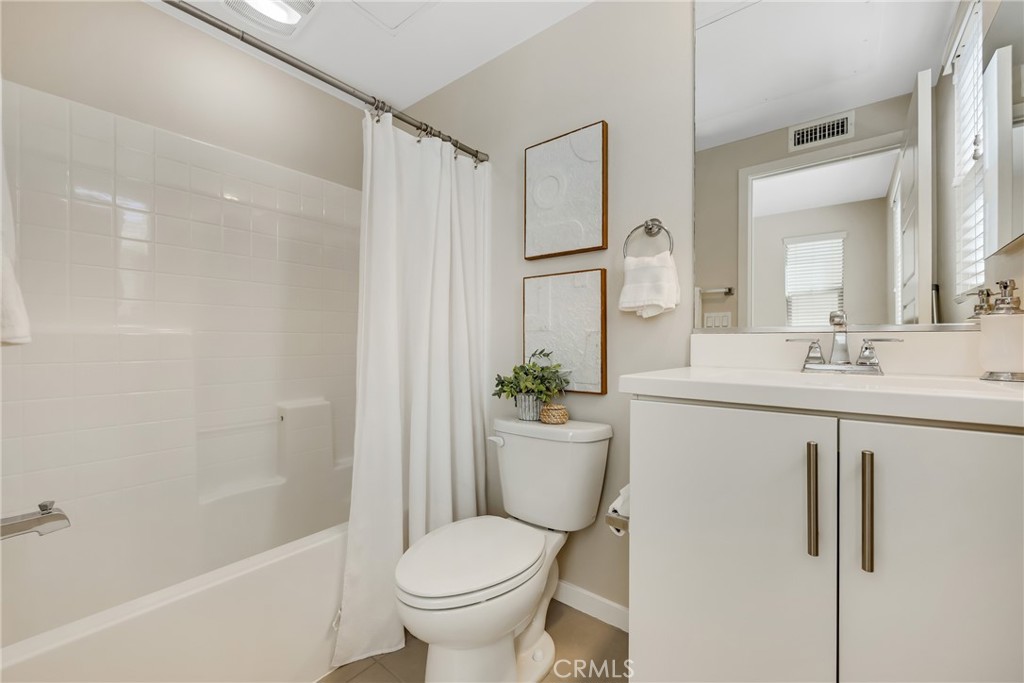 181 Magnet Irvine, CA 92618 - Photo 41 of 45 a bathroom with a sink toilet and shower