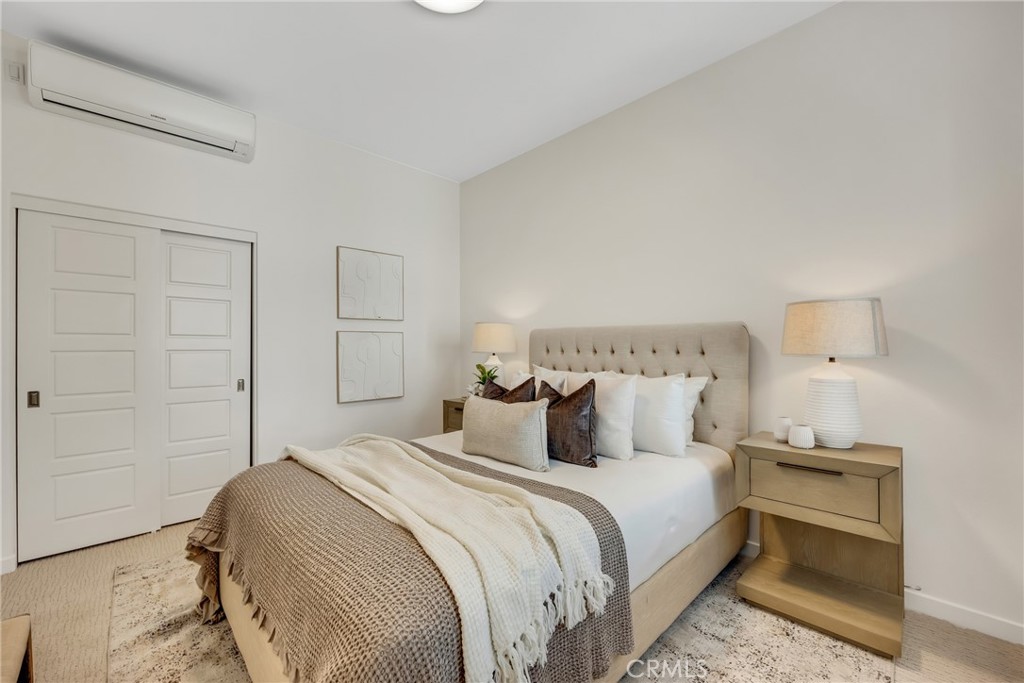 181 Magnet Irvine, CA 92618 - Photo 7 of 45 a bedroom with a bed and a night stand