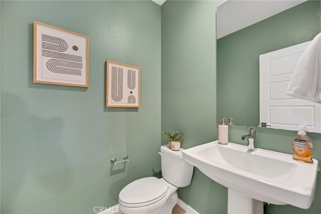 181 Magnet Irvine, CA 92618 - Photo 9 of 45 a white toilet sitting next to a bathroom sink