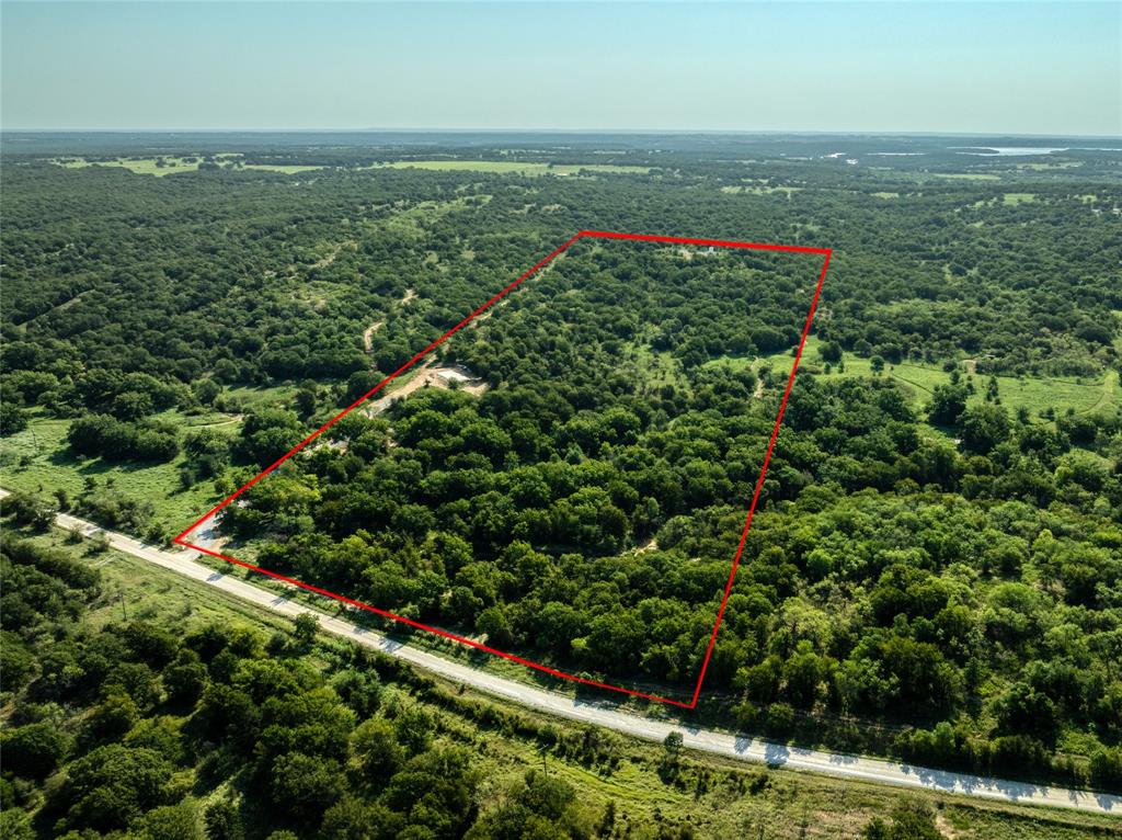 2913 County Line Road Chico, TX 76431 - Photo 13 of 18 an aerial view of residential houses with outdoor space and trees