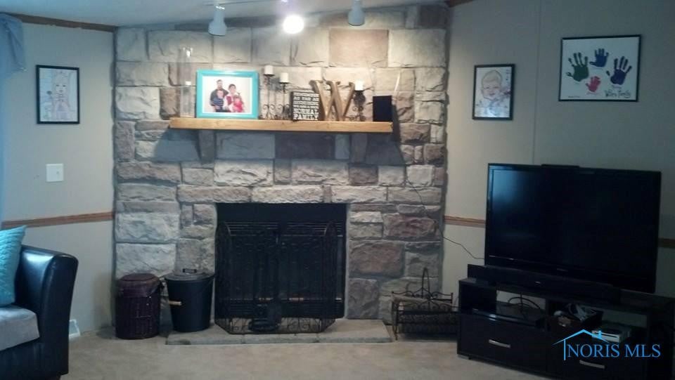 27484 Oregon Road, Unit 4 Perrysburg, OH 43551 - Photo 2 of 20 Nice wood burning fireplace!