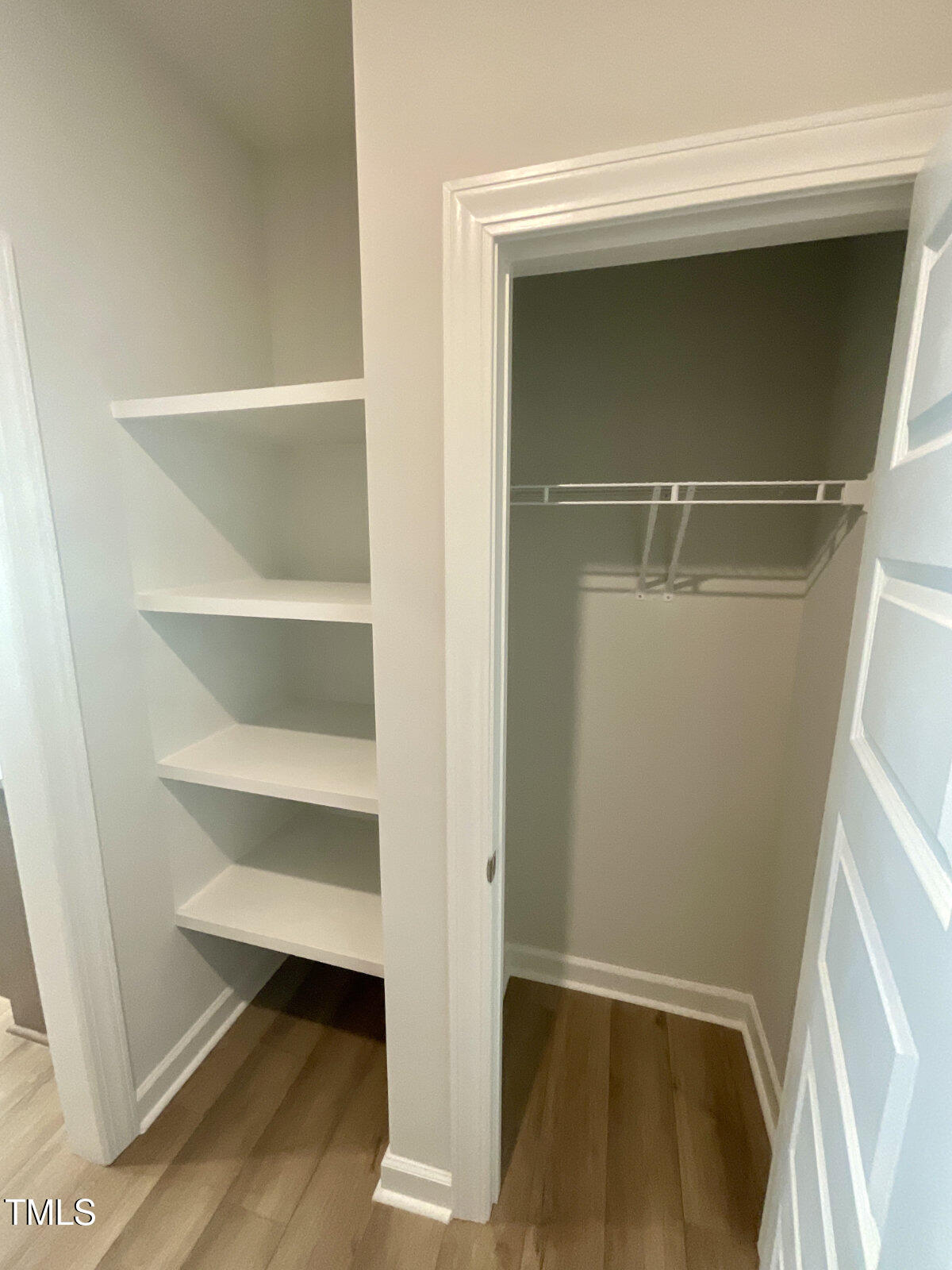 166 Nimble Way Clayton, NC 27520 - Photo 14 of 40 a view of an empty walk in closet