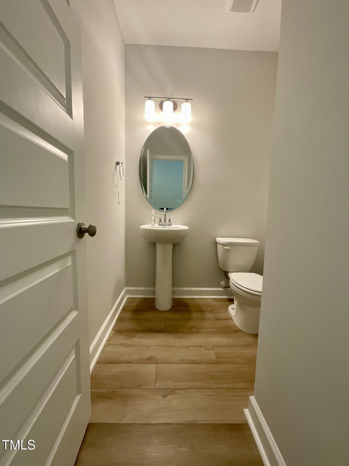 166 Nimble Way Clayton, NC 27520 - Photo 20 of 40 a bathroom with a toilet