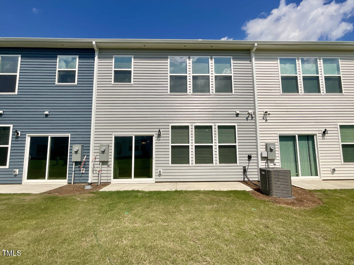 166 Nimble Way Clayton, NC 27520 - Photo 2 of 40 a front view of a house with a large window