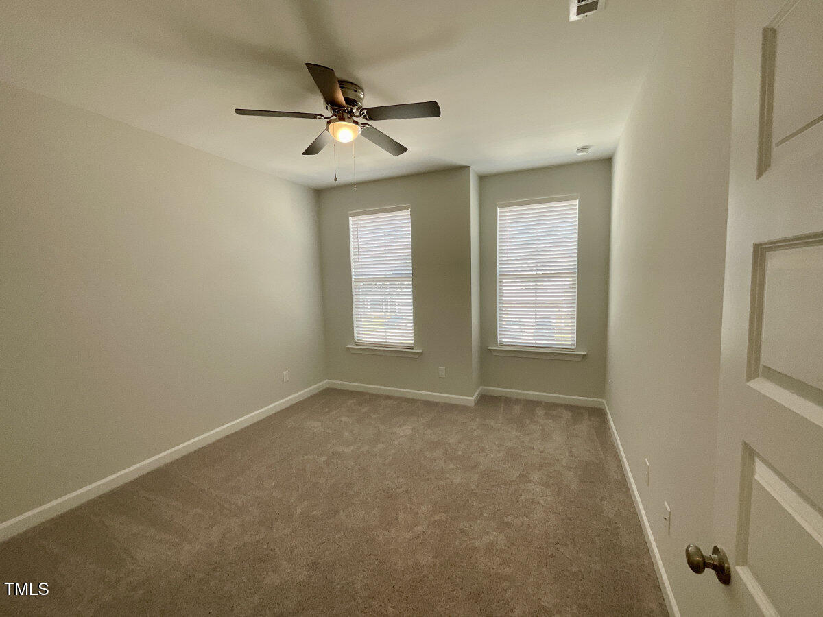 166 Nimble Way Clayton, NC 27520 - Photo 26 of 40 a view of an empty room with a window