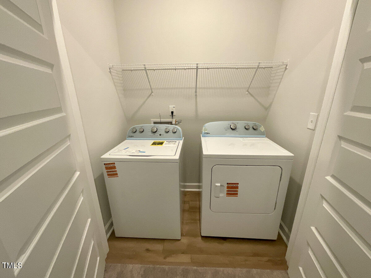 166 Nimble Way Clayton, NC 27520 - Photo 30 of 40 a utility room with dryer and washer