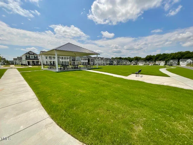 a view of a swimming pool with a patio