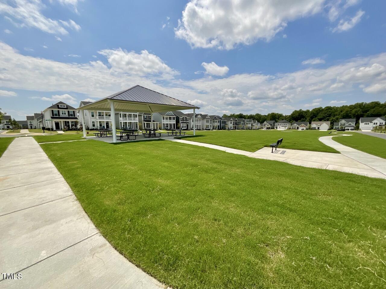 166 Nimble Way Clayton, NC 27520 - Photo 35 of 40 a view of a big house with a big yard