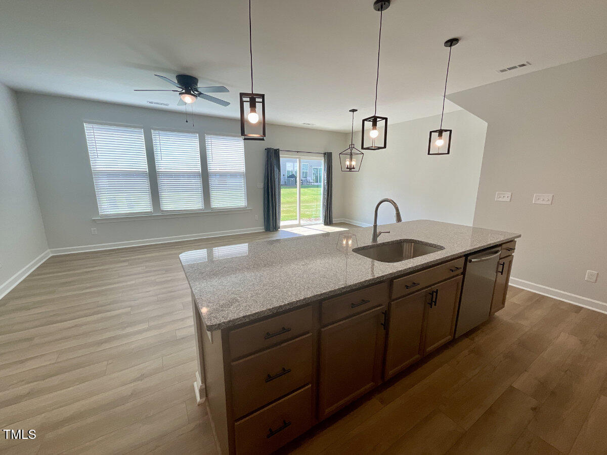 166 Nimble Way Clayton, NC 27520 - Photo 6 of 40 a kitchen with sink and window